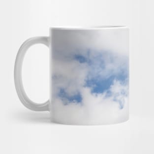 Looking up at the soft and white clouds! Mug